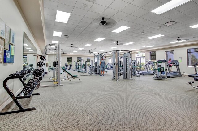 23528 Awabuki Dr Unit 101, Venice, FL 34293 - gym featuring baseboards and a drop ceiling