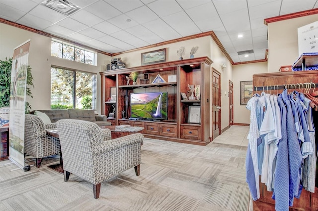 23528 Awabuki Dr Unit 101, Venice, FL 34293 - living area with crown molding, light carpet, recessed lighting, and baseboards