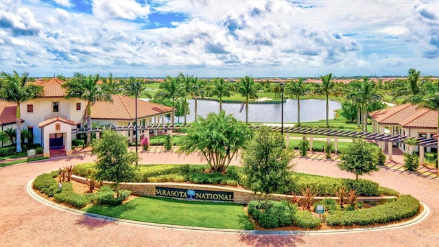 23528 Awabuki Dr Unit 101, Venice, FL 34293 - surrounding community with a water view and a pergola