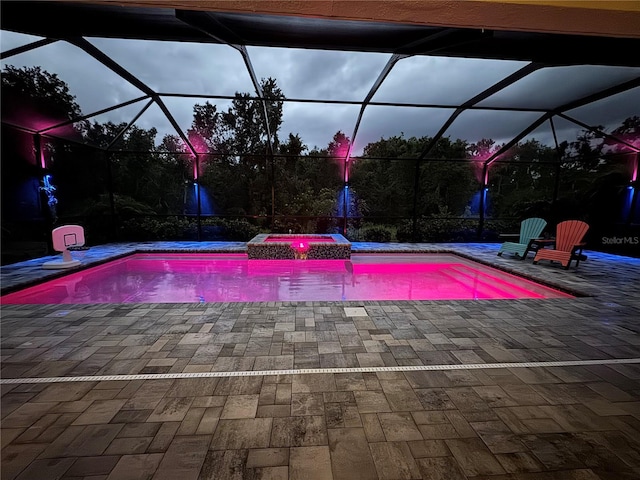 8916 Isabella Cir, Parrish, FL 34219 - view of pool with a patio area, a lanai, and a pool with connected hot tub