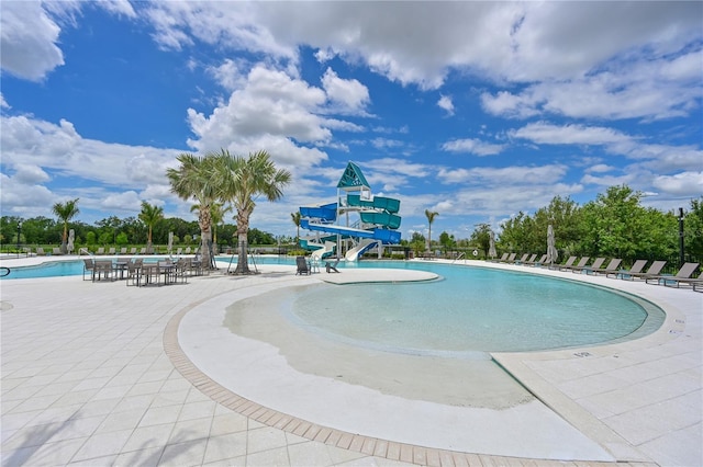 8916 Isabella Cir, Parrish, FL 34219 - community pool featuring a water slide and a patio