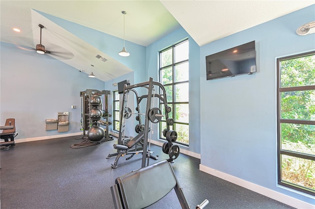 8916 Isabella Cir, Parrish, FL 34219 - exercise area featuring a ceiling fan, baseboards, and high vaulted ceiling