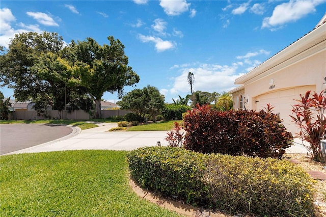 4804 Jacaranda Heights Dr, Venice, FL 34293 - view of yard featuring an attached garage