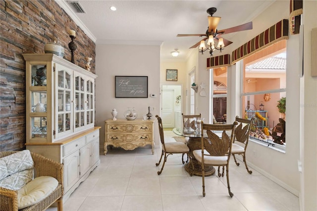4804 Jacaranda Heights Dr, Venice, FL 34293 - dining room featuring a ceiling fan, ornamental molding, light tile patterned floors, and baseboards