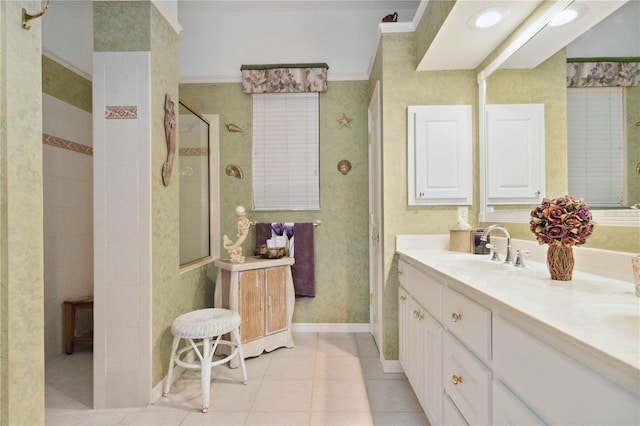 4804 Jacaranda Heights Dr, Venice, FL 34293 - full bath with double vanity, tile patterned floors, tiled shower, and baseboards