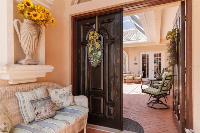 4804 Jacaranda Heights Dr, Venice, FL 34293 - doorway to property featuring french doors and a porch