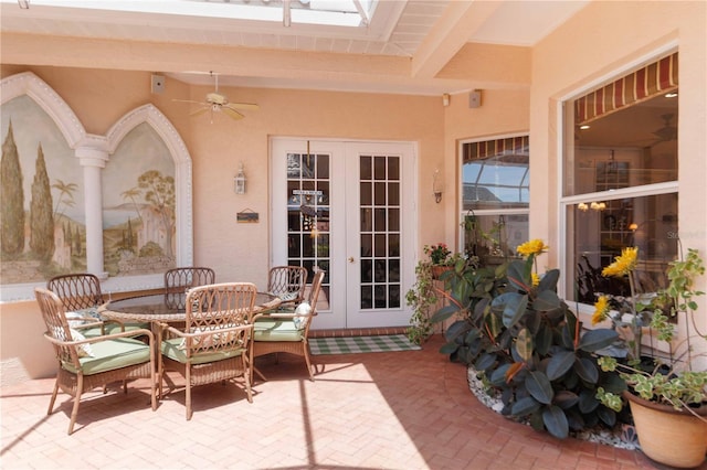 4804 Jacaranda Heights Dr, Venice, FL 34293 - view of patio / terrace featuring french doors, a ceiling fan, and outdoor dining space