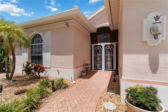 4804 Jacaranda Heights Dr, Venice, FL 34293 - entrance to property with stucco siding