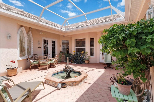 4804 Jacaranda Heights Dr, Venice, FL 34293 - view of patio with ceiling fan and a lanai