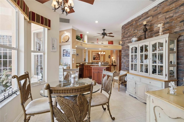 4804 Jacaranda Heights Dr, Venice, FL 34293 - dining room with a chandelier, a ceiling fan, light tile patterned floors, recessed lighting, and ornamental molding