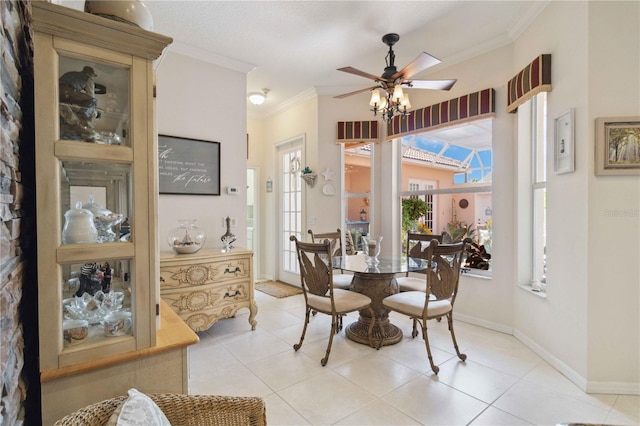 4804 Jacaranda Heights Dr, Venice, FL 34293 - dining room with ornamental molding, a ceiling fan, baseboards, and light tile patterned floors