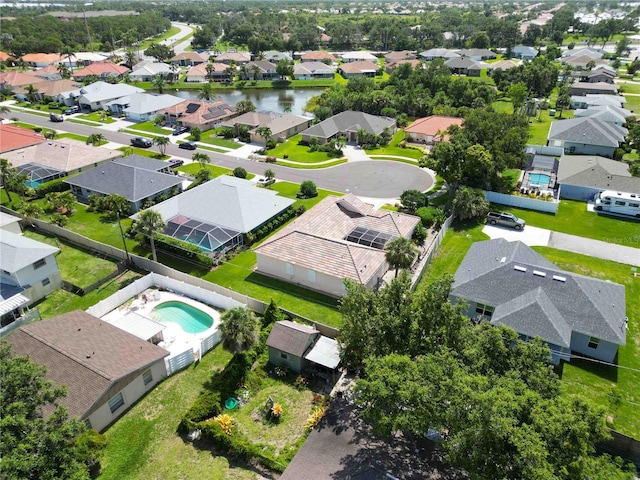 4804 Jacaranda Heights Dr, Venice, FL 34293 - aerial perspective of suburban area with a pool and a large body of water