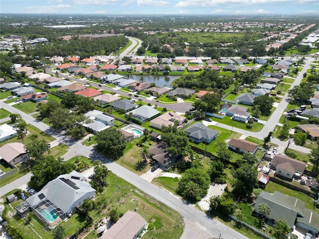 4804 Jacaranda Heights Dr, Venice, FL 34293 - aerial view of property's location with nearby suburban area and a large body of water