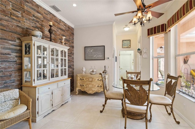 4804 Jacaranda Heights Dr, Venice, FL 34293 - dining room featuring light tile patterned floors, a ceiling fan, and ornamental molding