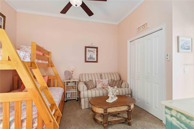 4804 Jacaranda Heights Dr, Venice, FL 34293 - bedroom featuring a closet, ornamental molding, carpet flooring, and a ceiling fan