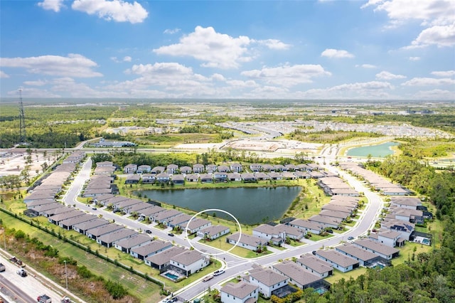 aerial perspective of suburban area featuring a large body of water