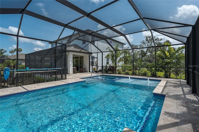 5651 Trevesta Pl, Palmetto, FL 34221 - view of pool with a patio, glass enclosure, and a pool with connected hot tub