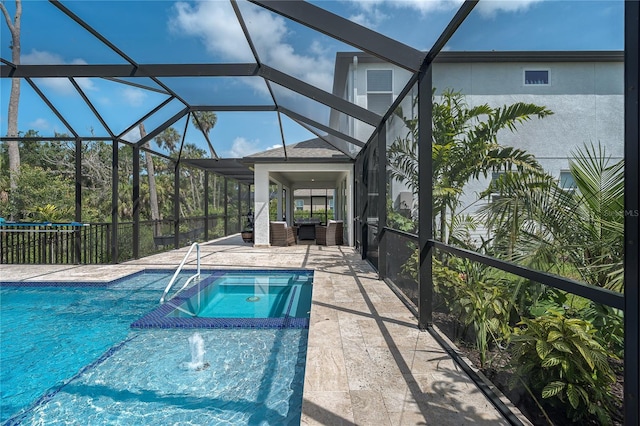 5651 Trevesta Pl, Palmetto, FL 34221 - view of swimming pool with a patio area, glass enclosure, an outdoor living space, and a pool with connected hot tub