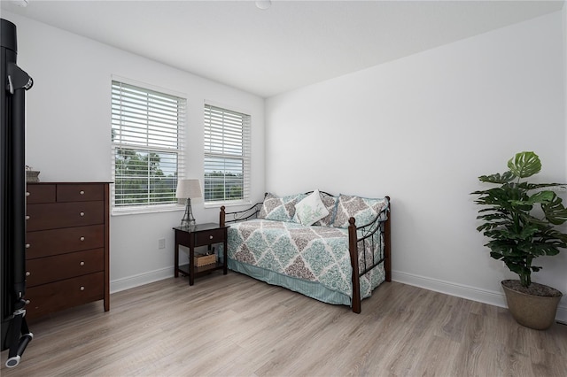 5651 Trevesta Pl, Palmetto, FL 34221 - bedroom featuring light wood-style flooring and baseboards