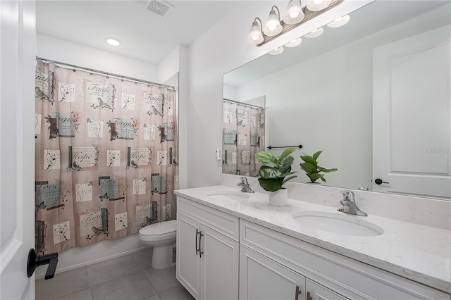 5651 Trevesta Pl, Palmetto, FL 34221 - bathroom with double vanity and tile patterned flooring