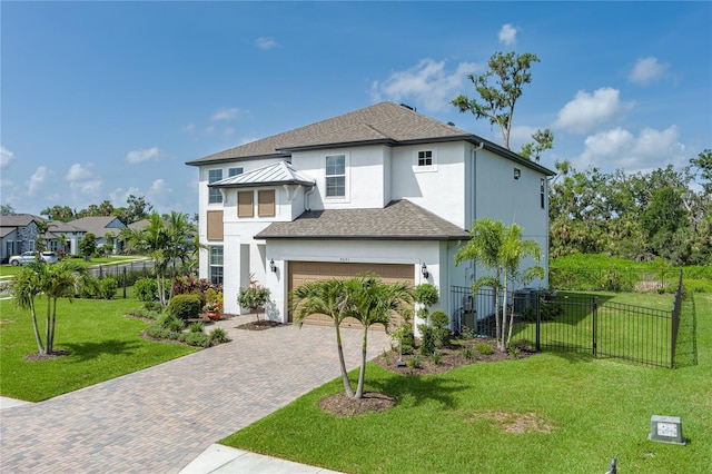 5651 Trevesta Pl, Palmetto, FL 34221 - view of front of property with decorative driveway, stucco siding, and roof with shingles