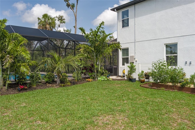 5651 Trevesta Pl, Palmetto, FL 34221 - view of green lawn with glass enclosure