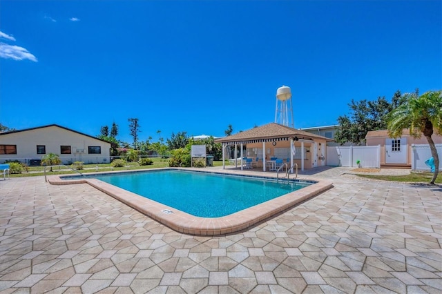 217 High Point Dr Unit 217A, Englewood, FL 34223 - community pool featuring a gazebo, a patio, and fence
