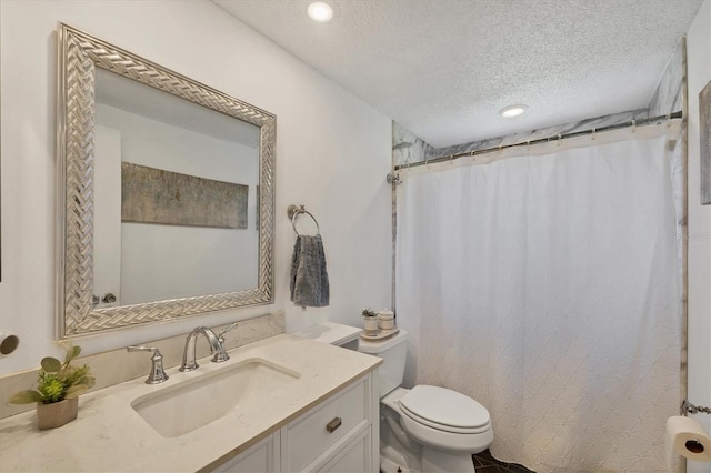 217 High Point Dr Unit 217A, Englewood, FL 34223 - full bath with a textured ceiling, toilet, vanity, recessed lighting, and curtained shower