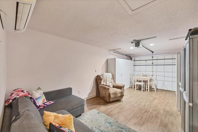 217 High Point Dr Unit 217A, Englewood, FL 34223 - garage with a garage door opener and baseboards