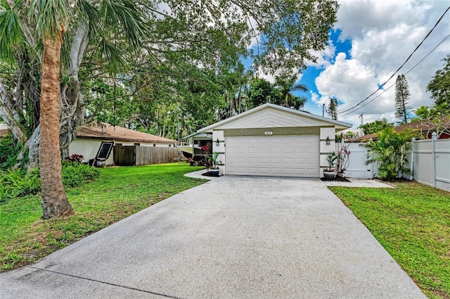 4115 2nd Ave NW, Bradenton, FL 34209 - view of front facade featuring asphalt driveway and a garage