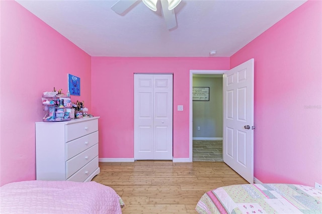 4115 2nd Ave NW, Bradenton, FL 34209 - bedroom featuring light wood-style floors, ceiling fan, baseboards, and a closet