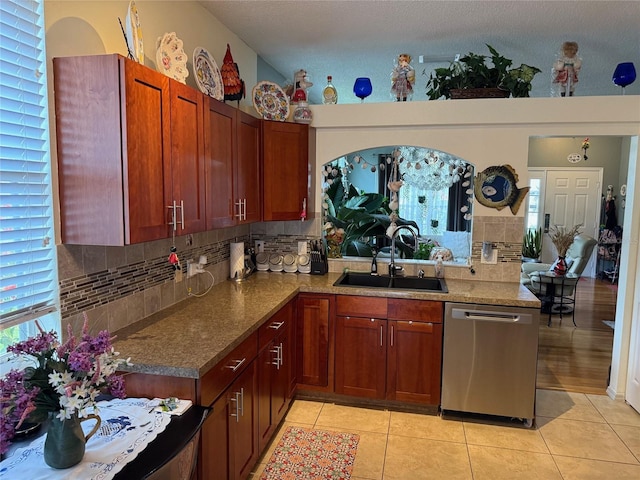 817 Tallgrass Ln, Bradenton, FL 34212 - kitchen featuring dishwasher, a sink, backsplash, and light tile patterned floors