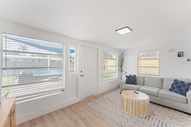2715 Herwald St, Sarasota, FL 34231 - living area with light wood-type flooring