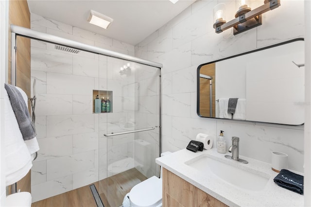 2715 Herwald St, Sarasota, FL 34231 - bathroom with toilet, a stall shower, and vanity