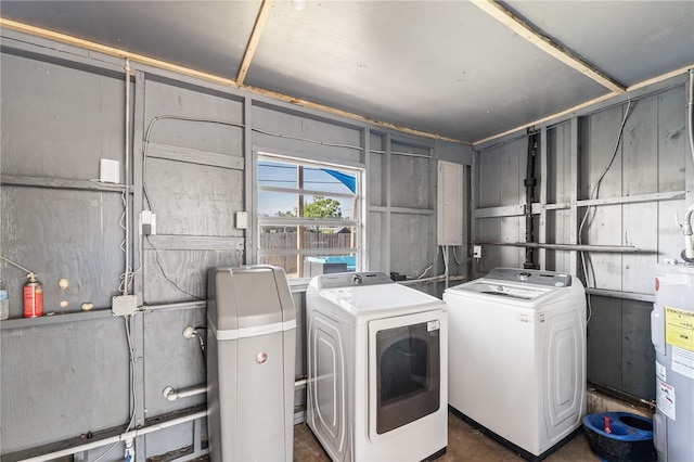 2715 Herwald St, Sarasota, FL 34231 - washroom featuring washer and clothes dryer and water heater