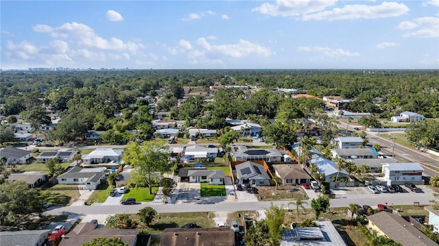 2715 Herwald St, Sarasota, FL 34231 - aerial perspective of suburban area featuring a heavily wooded area