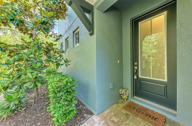 4500 Chinkapin Dr, Sarasota, FL 34232 - property entrance featuring stucco siding