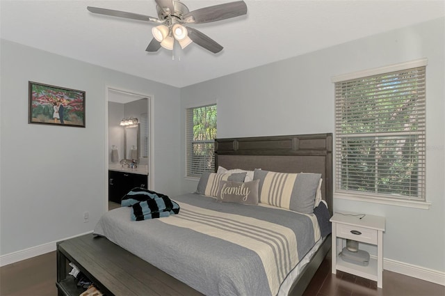 4500 Chinkapin Dr, Sarasota, FL 34232 - bedroom with baseboards, dark wood finished floors, ensuite bathroom, and a ceiling fan
