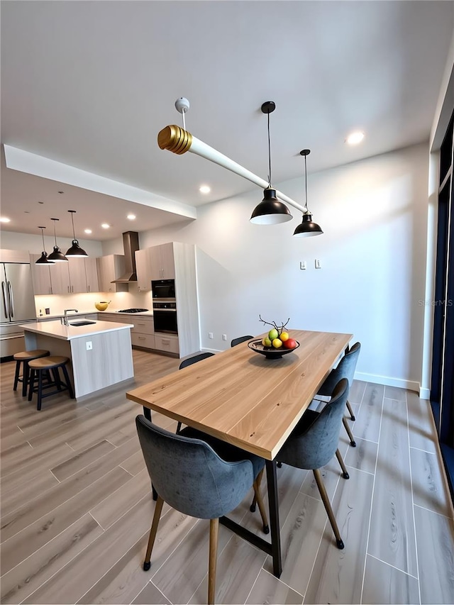 33 S Palm Ave Unit 1202, Sarasota, FL 34236 - dining space featuring light wood-style flooring and recessed lighting