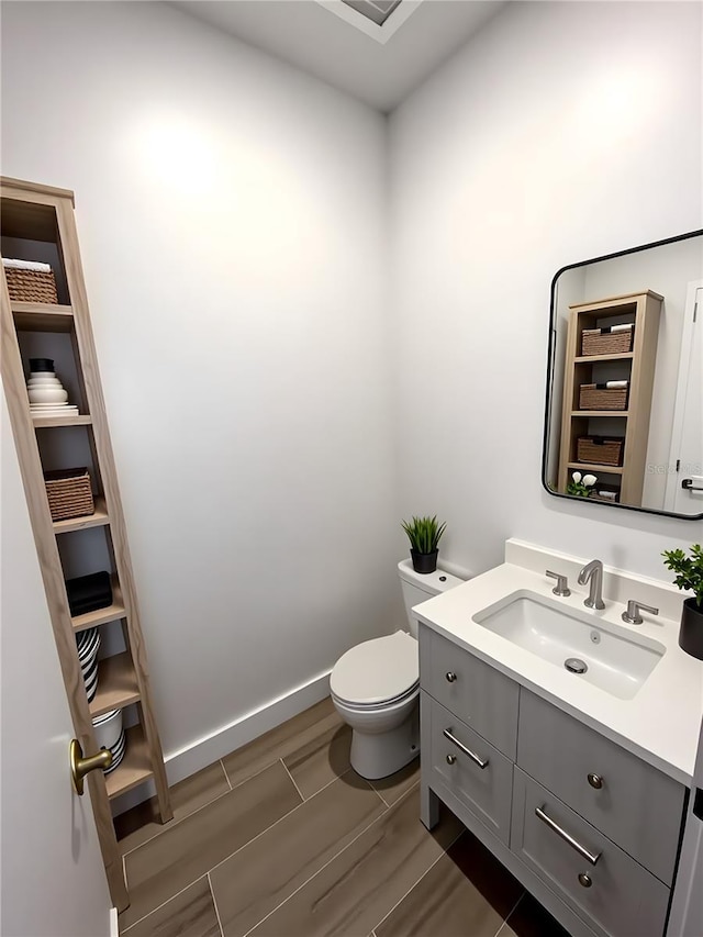 33 S Palm Ave Unit 1202, Sarasota, FL 34236 - bathroom with vanity, toilet, and wood finish floors