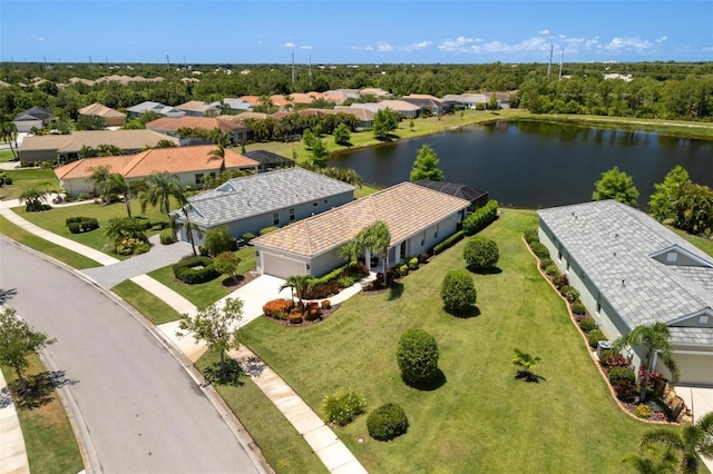 aerial perspective of suburban area featuring a large body of water