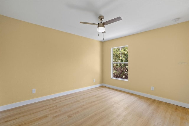 1399 Shields St, Punta Gorda, FL 33980 - spare room with light wood finished floors, baseboards, ceiling fan, and a smoke detector