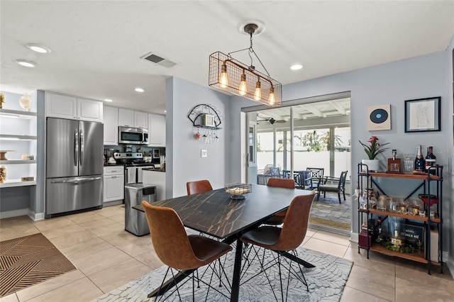6841 Roxbury Dr, Sarasota, FL 34231 - dining area featuring light tile patterned floors, recessed lighting, and ceiling fan
