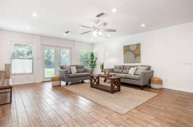 1345 24th St, Sarasota, FL 34234 - living room with baseboards, light wood-style floors, recessed lighting, and a ceiling fan