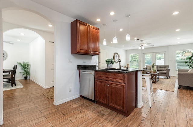 1345 24th St, Sarasota, FL 34234 - kitchen featuring dishwasher, a ceiling fan, a peninsula, light wood-type flooring, and recessed lighting
