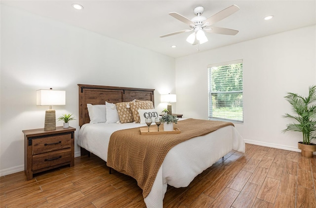 1345 24th St, Sarasota, FL 34234 - bedroom with light wood-type flooring, baseboards, recessed lighting, and ceiling fan