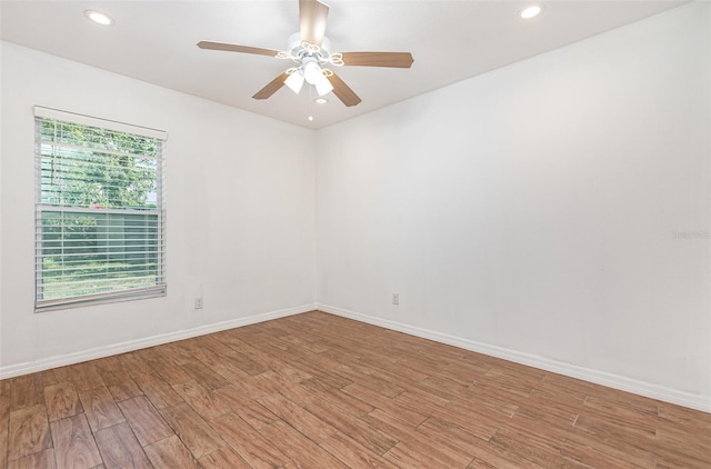 1345 24th St, Sarasota, FL 34234 - unfurnished room with light wood finished floors, recessed lighting, baseboards, and ceiling fan