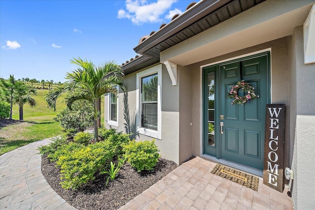 6250 Grandview Hill Ct, Bradenton, FL 34203 - property entrance with stucco siding