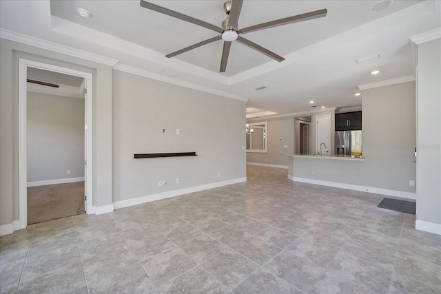 6250 Grandview Hill Ct, Bradenton, FL 34203 - unfurnished living room with a ceiling fan, ornamental molding, recessed lighting, a raised ceiling, and a sink