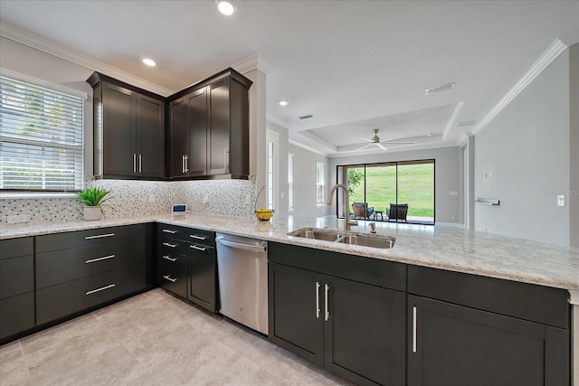 6250 Grandview Hill Ct, Bradenton, FL 34203 - kitchen with a sink, stainless steel dishwasher, light stone countertops, a raised ceiling, and crown molding